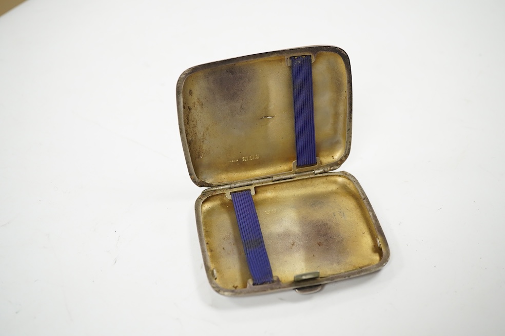 Three assorted silver cigarette cases, largest 11.7cm, a pair of small silver dishes and two silver sauceboats, gross 24.5oz. Condition - poor to fair